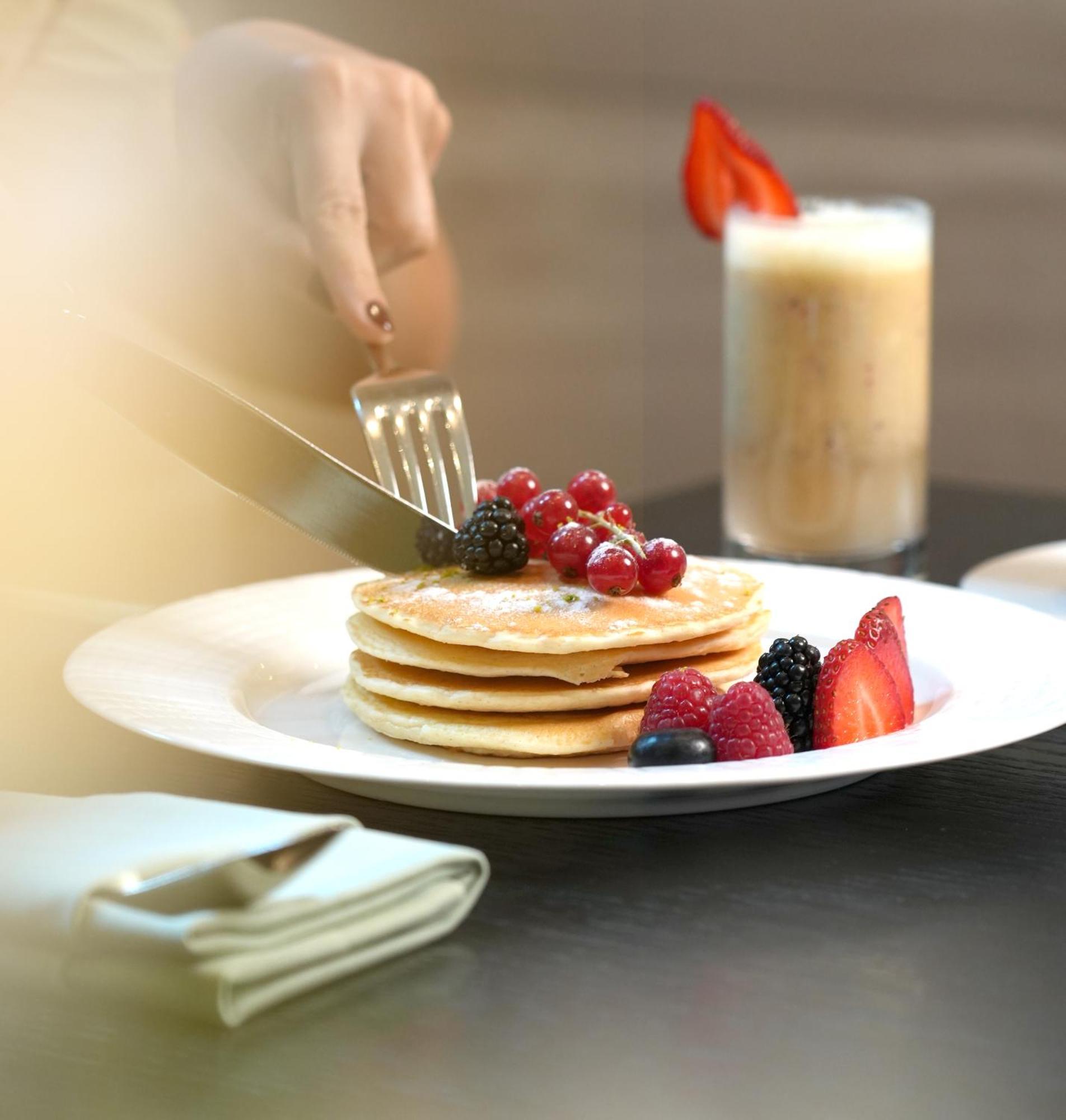 Fairmont Riyadh Exterior photo A stack of pancakes with fruit