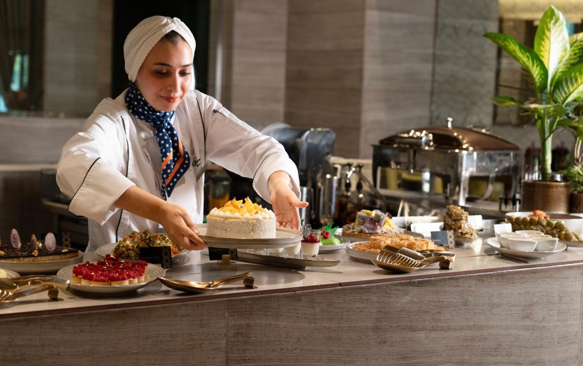 Fairmont Riyadh Exterior photo A pastry chef at work